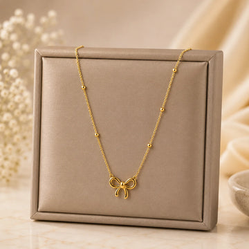 Elegant Gold Bow Pendant Necklace